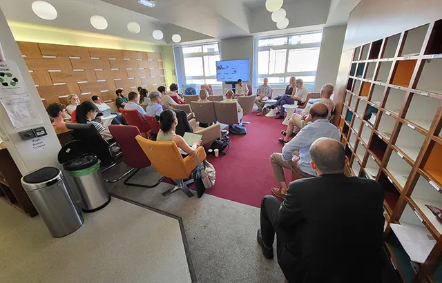 Guests watching the book symposium at Queen Mary School of Law.