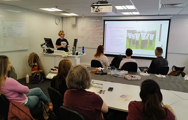 Dr Emma Campbell delivering the creative arts workshop.