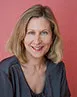 Geraldine Van Beuren profile photo on a pink background