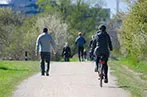 People running, jogging and walking in the park