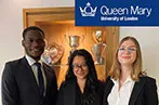 Basanti Mardemootoo, Rojae Brown, and Mara Ioniță standing together in front of a trophy case