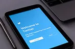 A tablet with the Twitter registration screen
