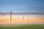 Wind turbines at dawn in the Netherlands.