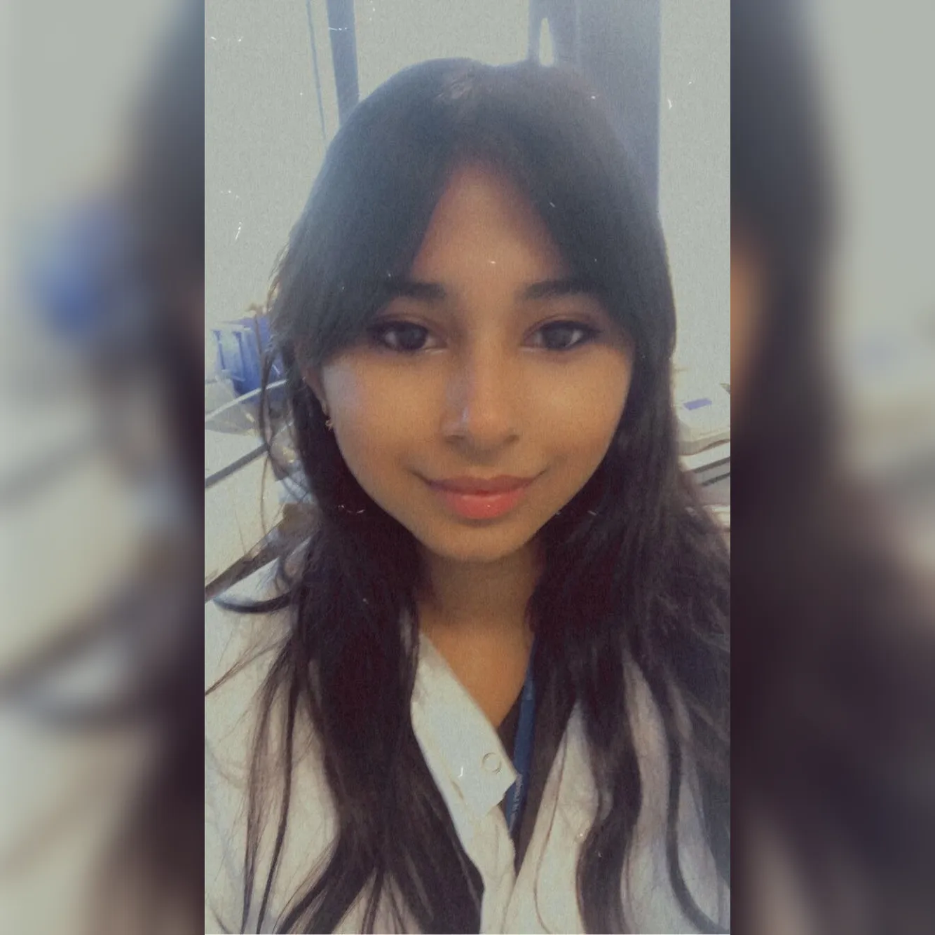 A female student in lab coat