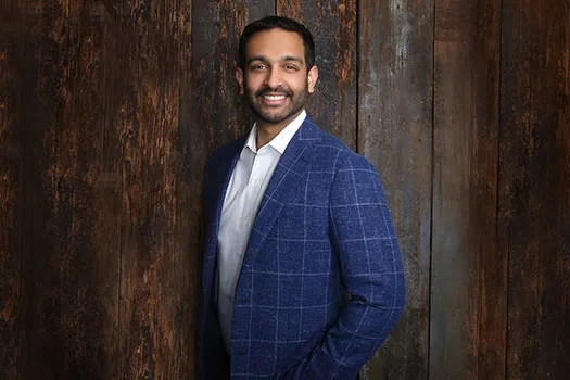 Nathan Koneru in a blue suit