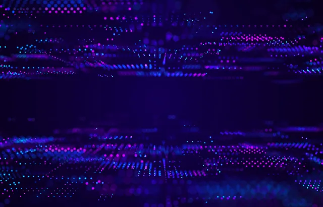 A microchip design in blue and purple.