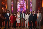 Queen Mary LLM students standing in a pillared hall at the AIEN 2025 conference.