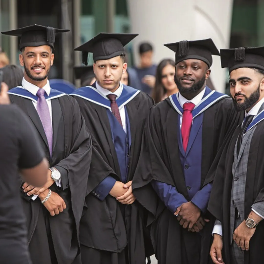 4 male students at their graduation