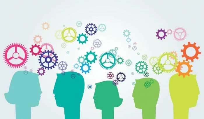 Graphic image of cog, wheel and heads