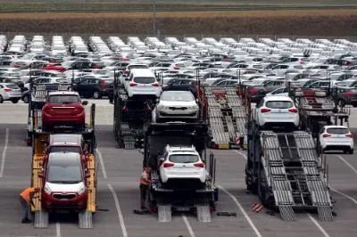 New Kia cars parked outside the Kia factory in Žilina, Slovakia