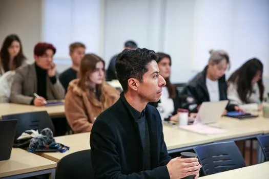 Postgraduate students in a seminar