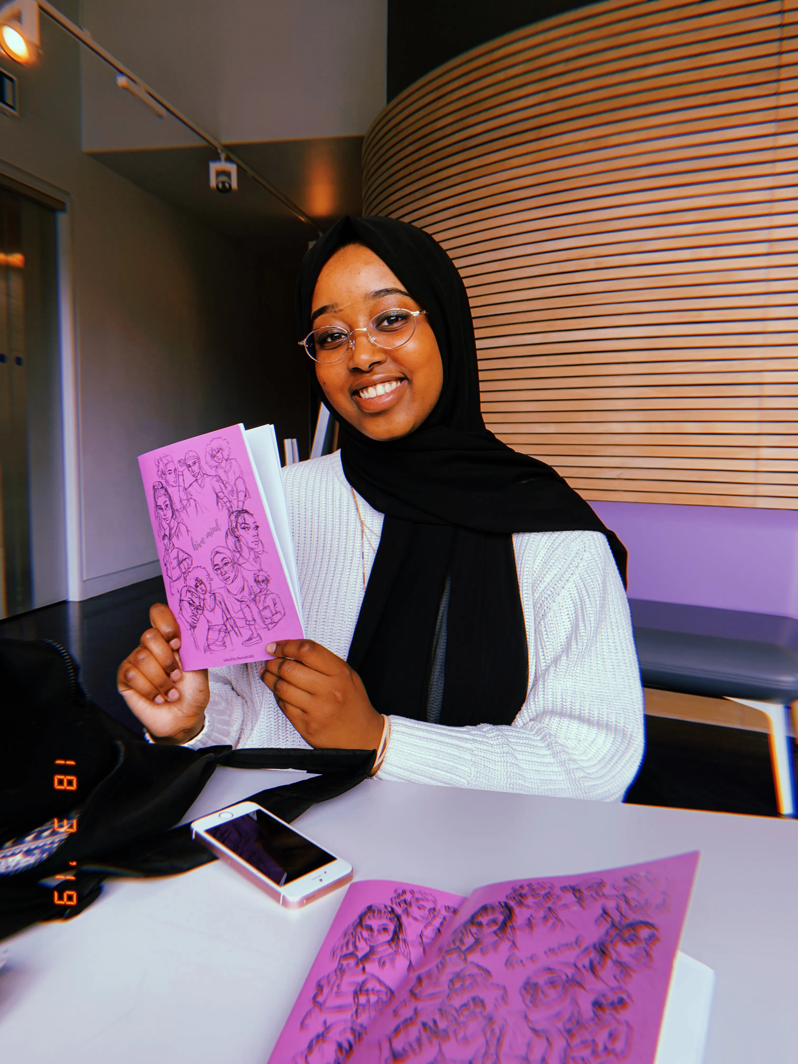 Hannah Idil with anthology 