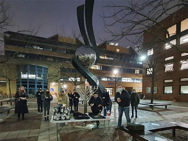 Hanukkah candle lighting at Mile End