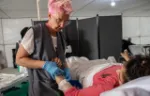 Becky Platt provides paid relief to child in Gaza