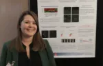 Harriet Allan with her poster at the STEM for Britain event