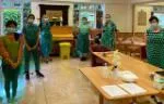 Queen Mary staff and student volunteers at a care home