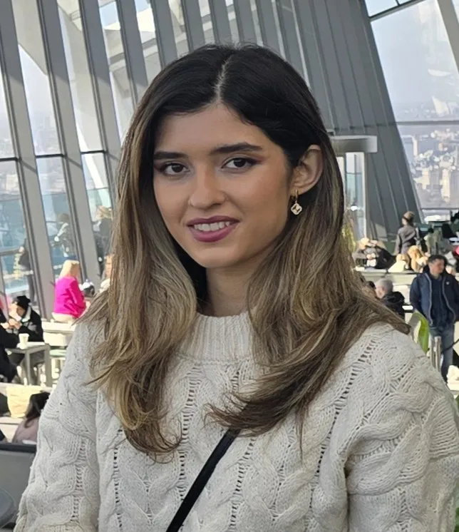 Student looking at camera smiling