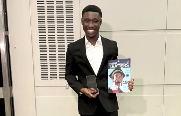 A student receiving an award