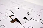 Puzzle piece being inserted into it's corresponding spot