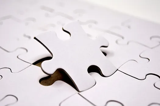 Puzzle piece being inserted into it's corresponding spot