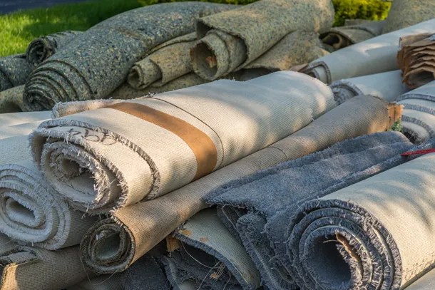 Pile of rolled-up carpets