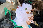Students writing out the word CHANGE