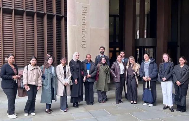 Another photo of Queen Mary qLegal students taking a group photo outside of the Bloomberg offices.