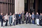 qLegal students standing outside the Bloomberg offices.