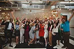 qLegal summer party attendees in a group photo