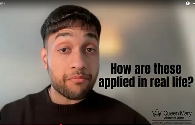 qLegal student speaking to camera in a video.