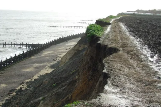 'Toxic waste is spilling onto beaches as rising seas erode landfills'