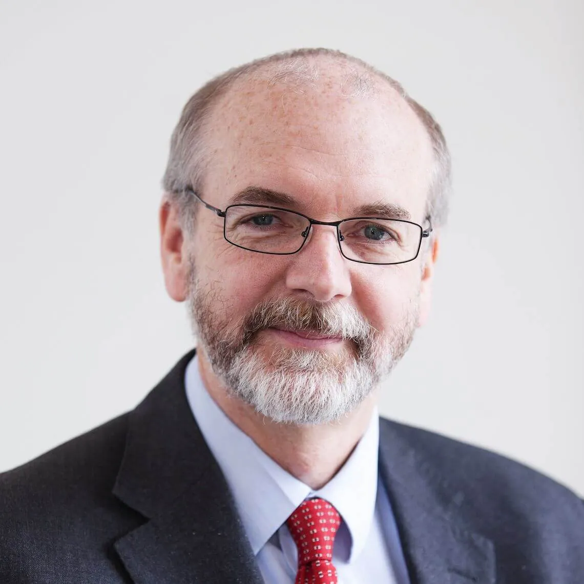 Headshot of alumnus Professor Andrew Pollard