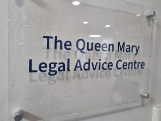 Photo of a sign that reads 'The Queen Mary Legal Advice Centre'