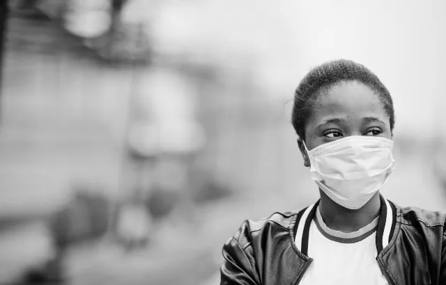 A girl wearing a face mask