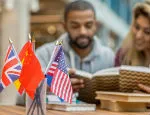 Studying behind flags on a desk