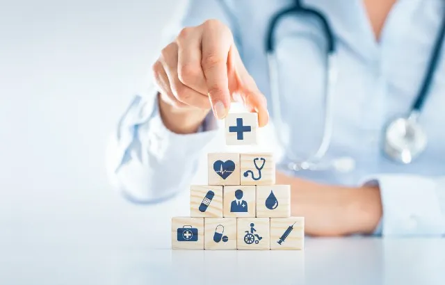 Doctor with building blocks