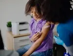 Girl receiving the HPV vaccine