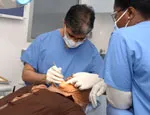 Dr Anand Lalli and patient