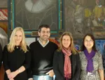 Professor Marelli-Berg with some of her research team