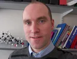 Dr Adrian Martineau