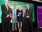 The team receive their award