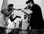 Baba Israel (right) rapping with AfroReggae