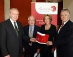 Mr Martin McGuinness (deputy First Minister), Professor Seán McConville, Dr Anna Bryson and Mr Peter Robinson (First Minister)