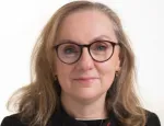 Headshot image of Giuliana wearing glasses