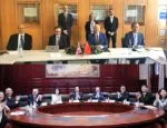 The signing ceremonies at Queen Mary (top) and HUST (below)