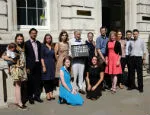 Returning our Ebola Medals with Lord Dubs