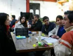 Queen Mary InQUBEate team working with a mentor 