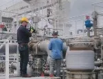 Dr Balcombe taking measurements onboard the Gaslog Galveston
