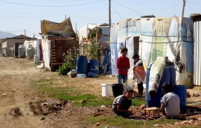 Children in a refugee camp. Credit: Nour Tayeh.