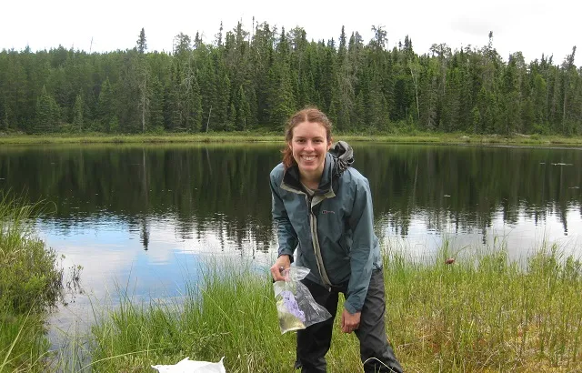 Dr Littlefair collecting a water sample at the lake shoreline which will later be analyzed for environmental DNA. Credit: Rachel Henderson